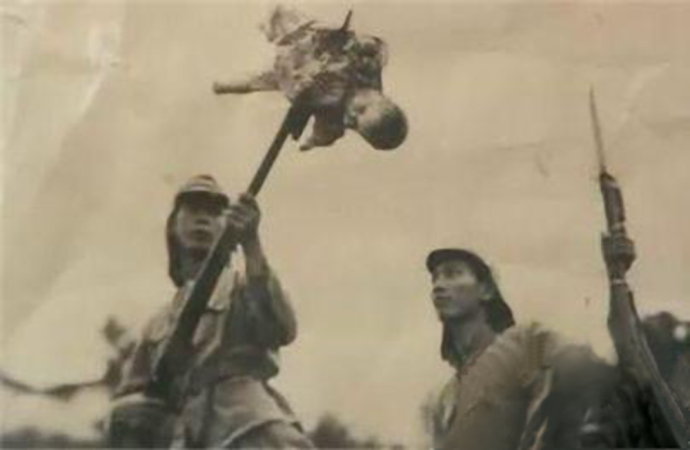 抗战时期日军杀人图片,日军残忍酷刑喝人血吃